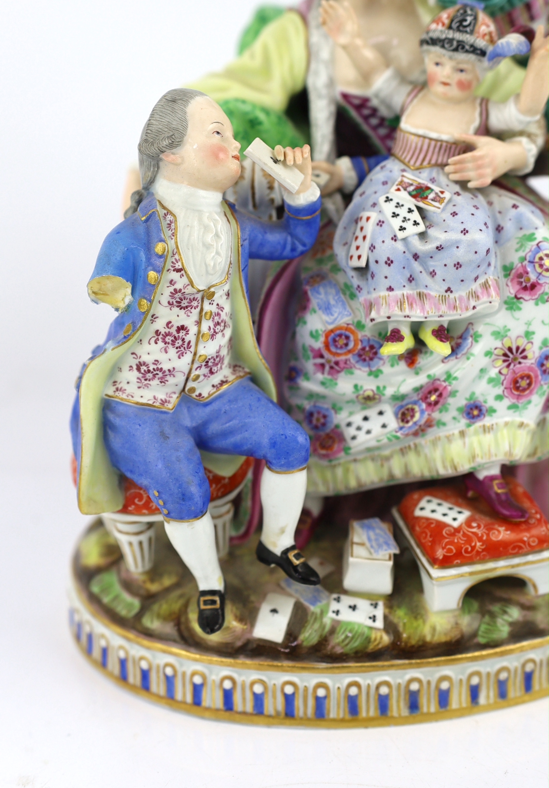 A Meissen group The Good Mother, 19th century, arm detached but present